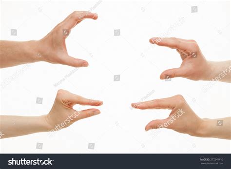 hands showing  sizes small big stock photo