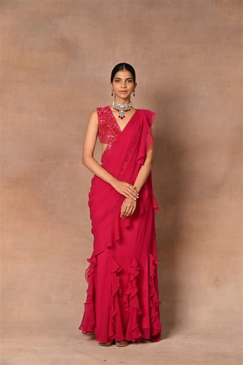 exquisite red drape saree mynah designs