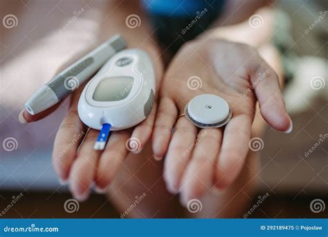 Close Up of Hands with Diabetes Supplies and Devices. Stock Image ...