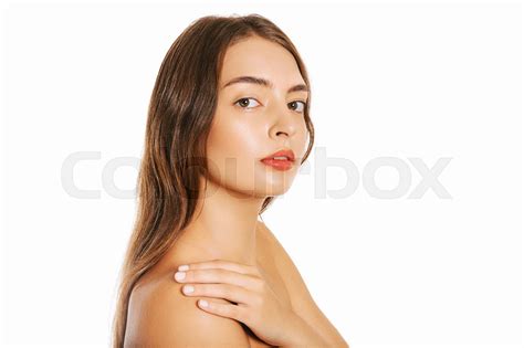 Close up portrait of beautiful young woman with perfect clean skin