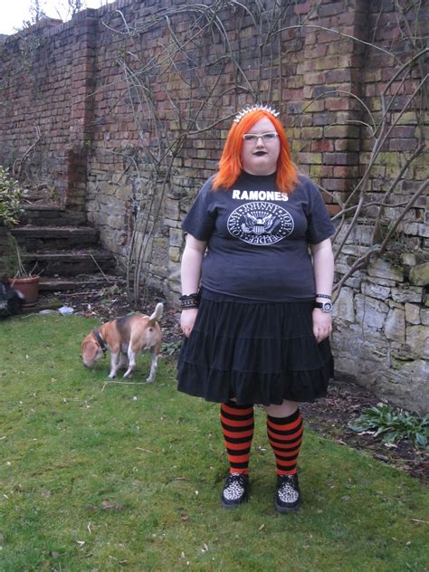 Black Sheep Goths • [image: “white, fat goth with bright orange hair...