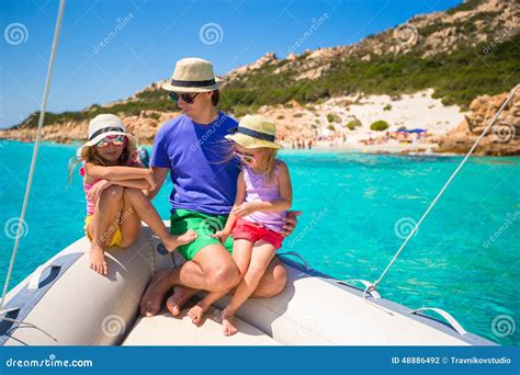 Little Girls Resting On Big Boat With Happy Dad Stock Photo - Image ...