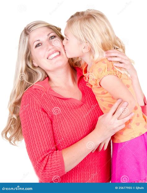 Daughter kissing mother stock image. Image of lifestyle - 25677955