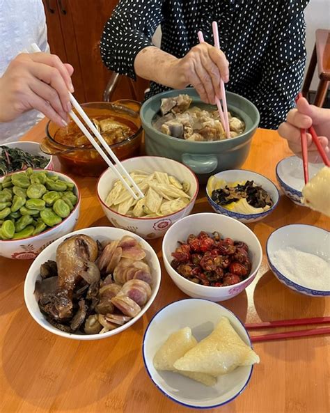 Premium Photo | A bowl of food with chopsticks and a chopstick.