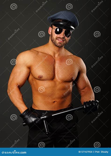 Muscular Policeman with Nightstick Stock Photo - Image of safety