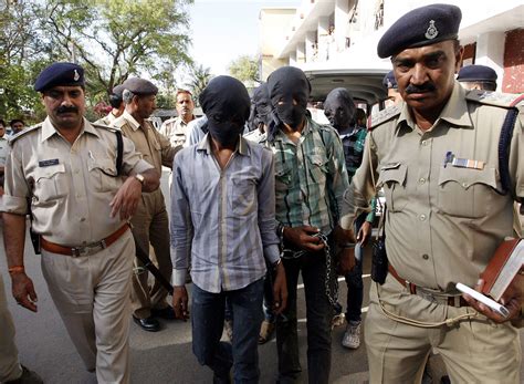 Six men arrested over gang-rape of Swiss tourist in India appear in