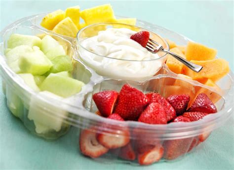 Fresh Fruit Tray with Dip on Table - Prepared Food Photos, Inc.