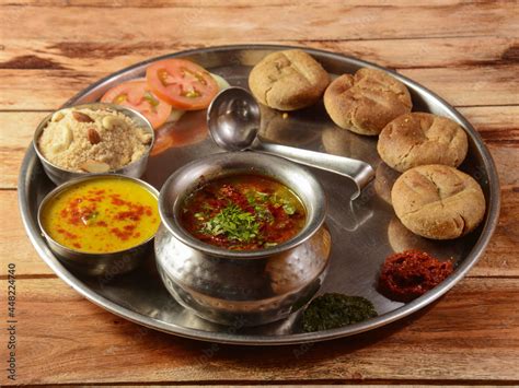 Rajasthani Traditional Cuisine Dal Baati Also Know as Dal Bati or Daal Baati Churma on Wooden ...