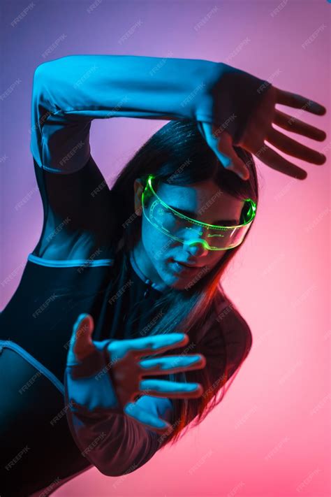Premium Photo | Futuristic studio portrait with neon lights of a