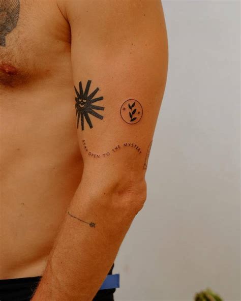 upper arm composition tattoos