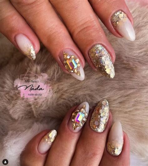 Shine Bright with These 50 Glamorous Gold Glitter Nail Ideas!