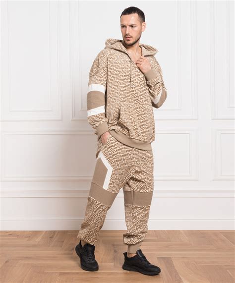 Balmain - Коричневое худи с фактурной монограммой AH1JT165JF36 купить в ...