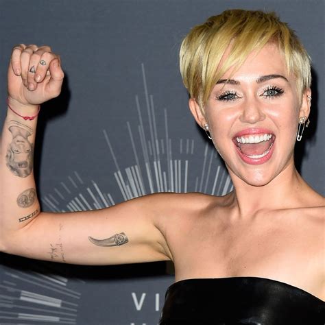Top more than 82 miley cyrus tattoos hand super hot - in.coedo.com.vn