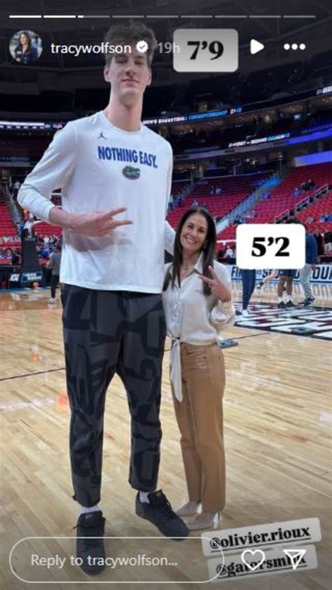 CBS' Tracy Wolfson looks tiny next to 7-foot-9 Florida freshman Olivier