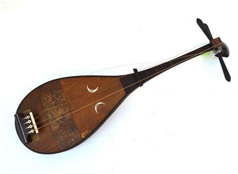 74: Two Middle Eastern Stringed Instruments : Lot 74