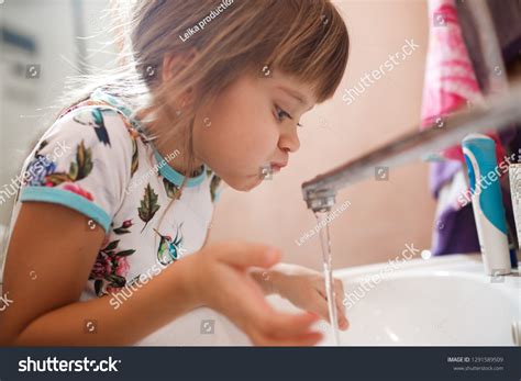 kid rinsing mouth   royalty  licensable stock