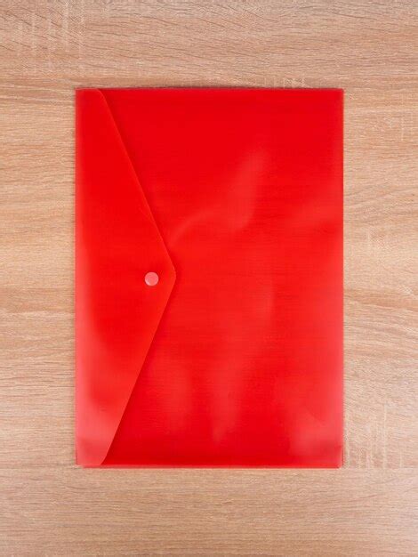 Premium Photo | Red plastic folder envelope for documents isolated on ...