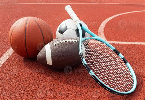 assorted sports equipment including  basketball soccer ball tennis