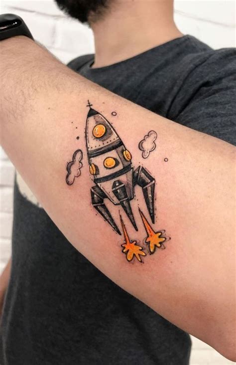 Rocket Tattoo | Rocket tattoo, Wrist tattoos for guys, Tattoo designs