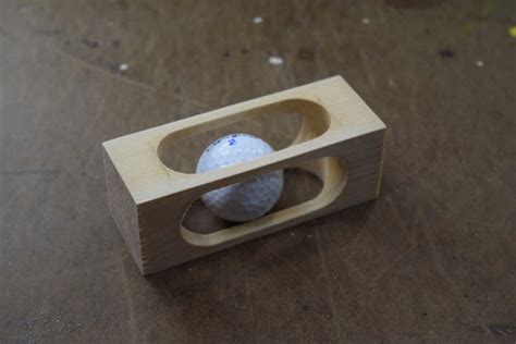 Golf Ball in a Block of Wood - WoodLogger