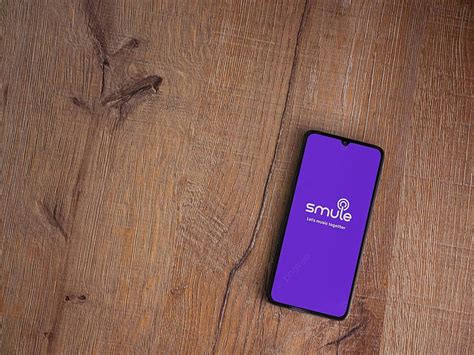 Launch Screen Of Smule App Displaying Logo On A Black Mobile Device ...