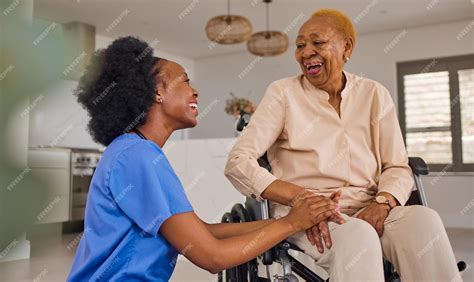 premium photo black people nurse  senior holding hands  wheelchair elderly care