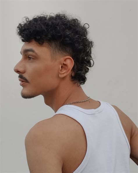 Top barbers explain how to perfectly maintain a modern afro mullet 6