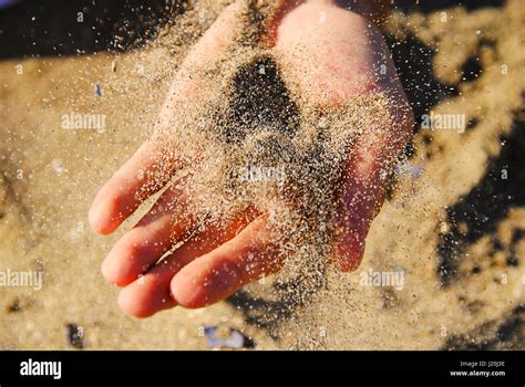 throwing  sand  res stock photography  images alamy