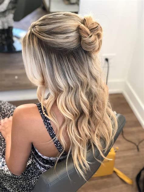 Stylists argue which half up half down prom hairstyles are dated 2