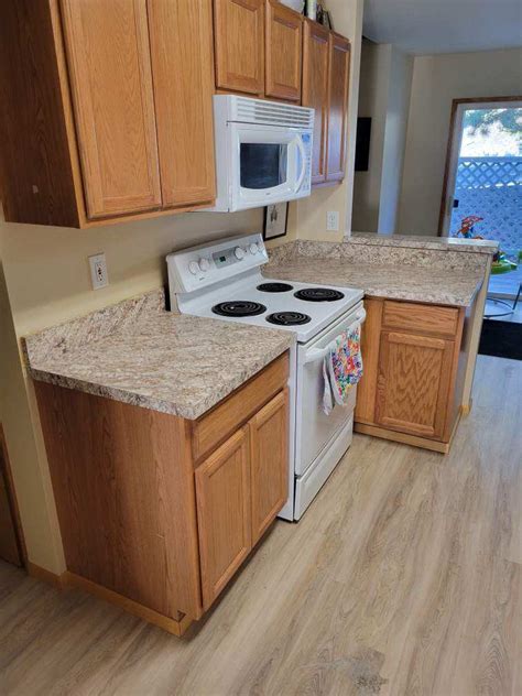 Solid Surface Countertops with All Wood Cabinets