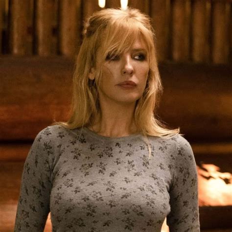 Download Kelly Reilly looking beautiful in a black dress | Wallpapers.com