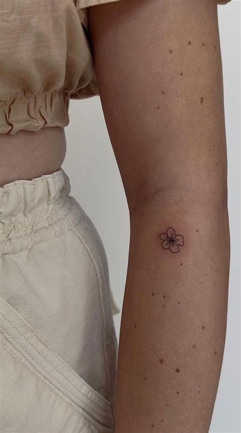 50 Small Tattoo Ideas Less is More : A Flower Tattoo on Arm I Take You ...