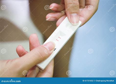 young women checking pregnancy test stock photo image  casual