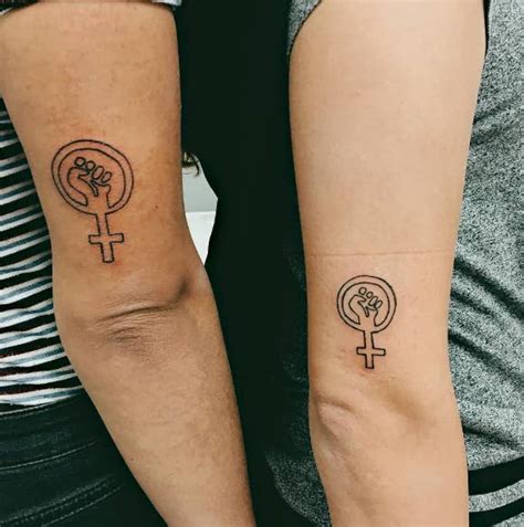 female gender symbol tattoo