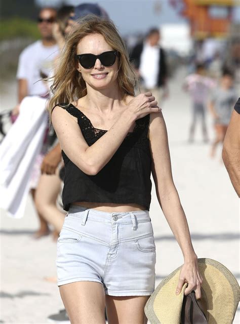 HEATHER GRAHAM Out with Her Boyfriend on the Beach in Miami 12/31/2016