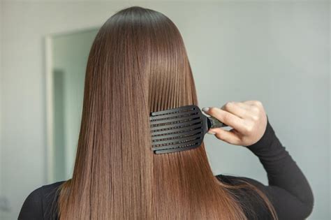 Premium Photo | Portrait of a beautiful woman with long brown straight ...
