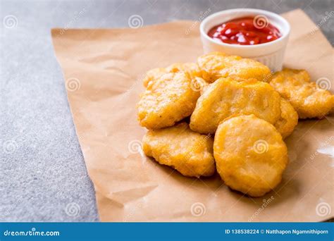 Chicken nuggets with sauce stock photo. Image of tasty - 138538224