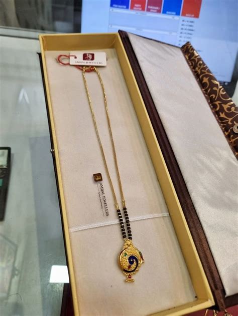 gold mangalsutra  gold jewellery designs black beads mangalsutra