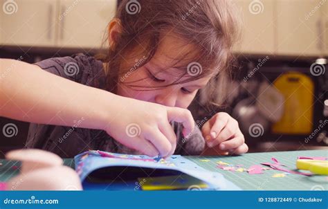 Scrapbooking. Little Girl is Glueing Colored Paper Stock Image - Image ...