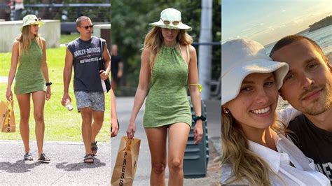 Model Natalie Roser puts on a leggy display in a short summer dress as
