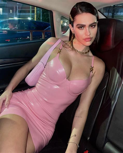 Amelia Gray Hamlin wows in pink latex Versace outfit