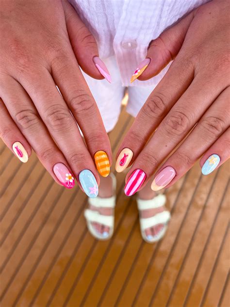Sun, Sand, And Stripes - The Ultimate White And Yellow Nail Art Look
