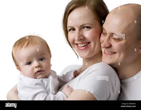 Happy smiling parents with the kid, isolated on white Stock Photo - Alamy