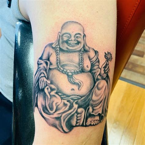 Top 77+ meaningful laughing buddha tattoo latest - in.cdgdbentre