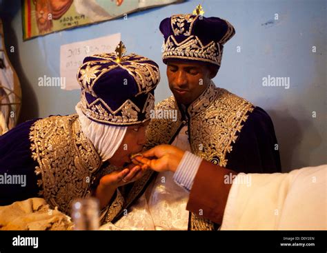 Priest Feeding Newlyweds During An Ethiopian Wedding In An Orthodox ...