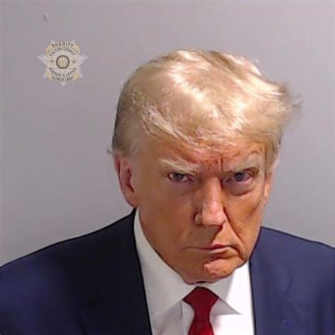 Donald Trump shares mugshot after turning himself into Georgia jail