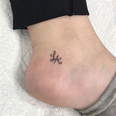 Freehand mini LA tattoo | Small tattoos, Tattoos, Tattoos for daughters