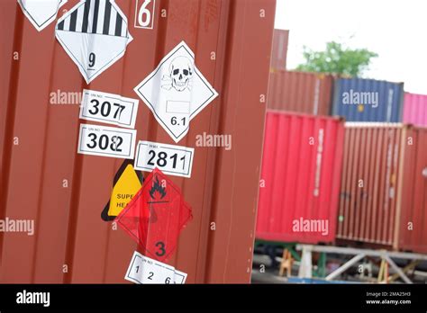 Dangerous stickers attached to containers Stock Photo - Alamy