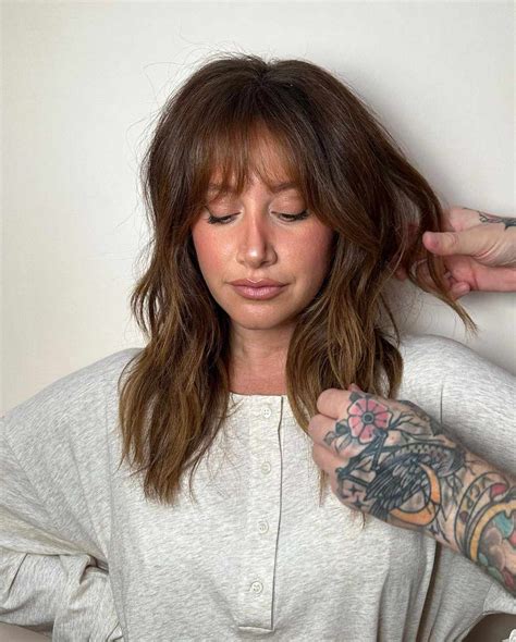 Ashley Tisdale Debuts New Curtain Bangs — See Her Summer Style!
