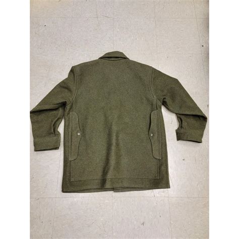 Filson Men's Green Coat | Depop